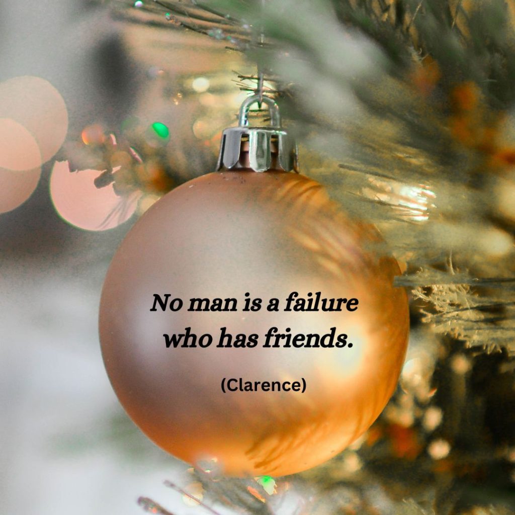 Gold Christmas ornament with quote from It's a Wonderful Life no man is a failure who has friends.