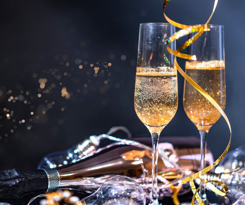 2 Glasses of champagne to show one of the tips to stay safe of New Year's Eve is to drink responsibly.