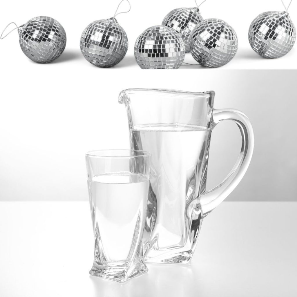 Avoiding weight gain by drinking water. Photo of pitcher of water with silver balls.
