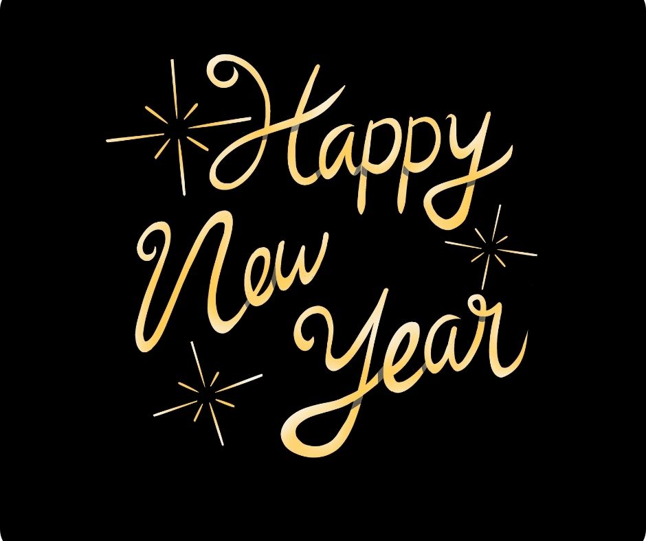 Gold lettering with happy new year on black background.