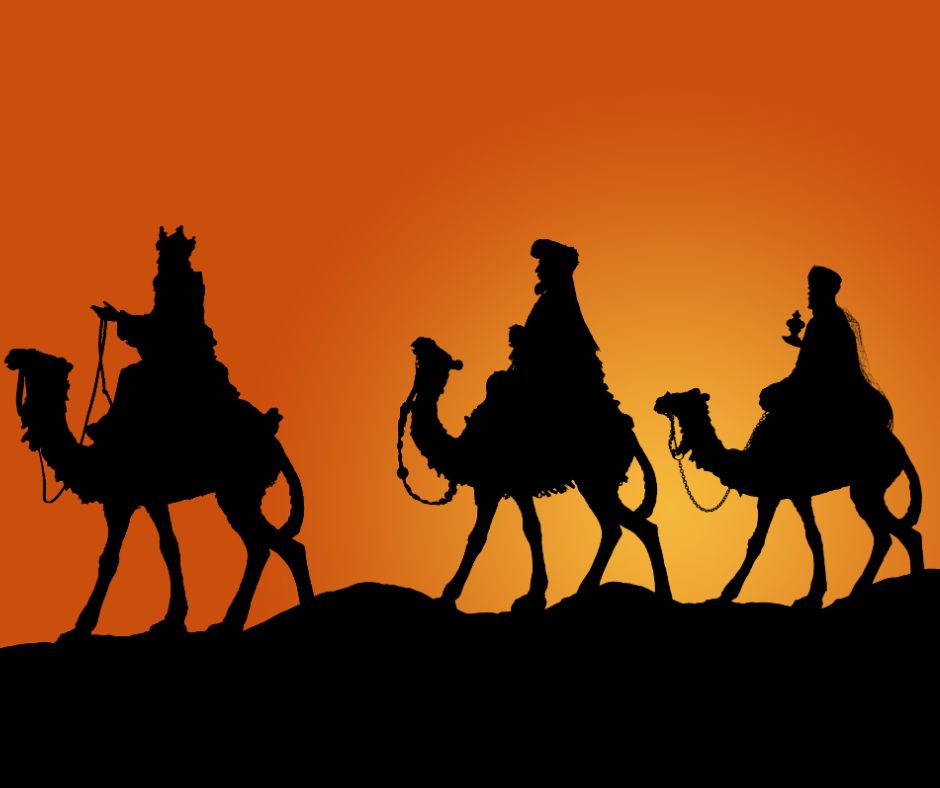 Sunset of 3 kings on camels.