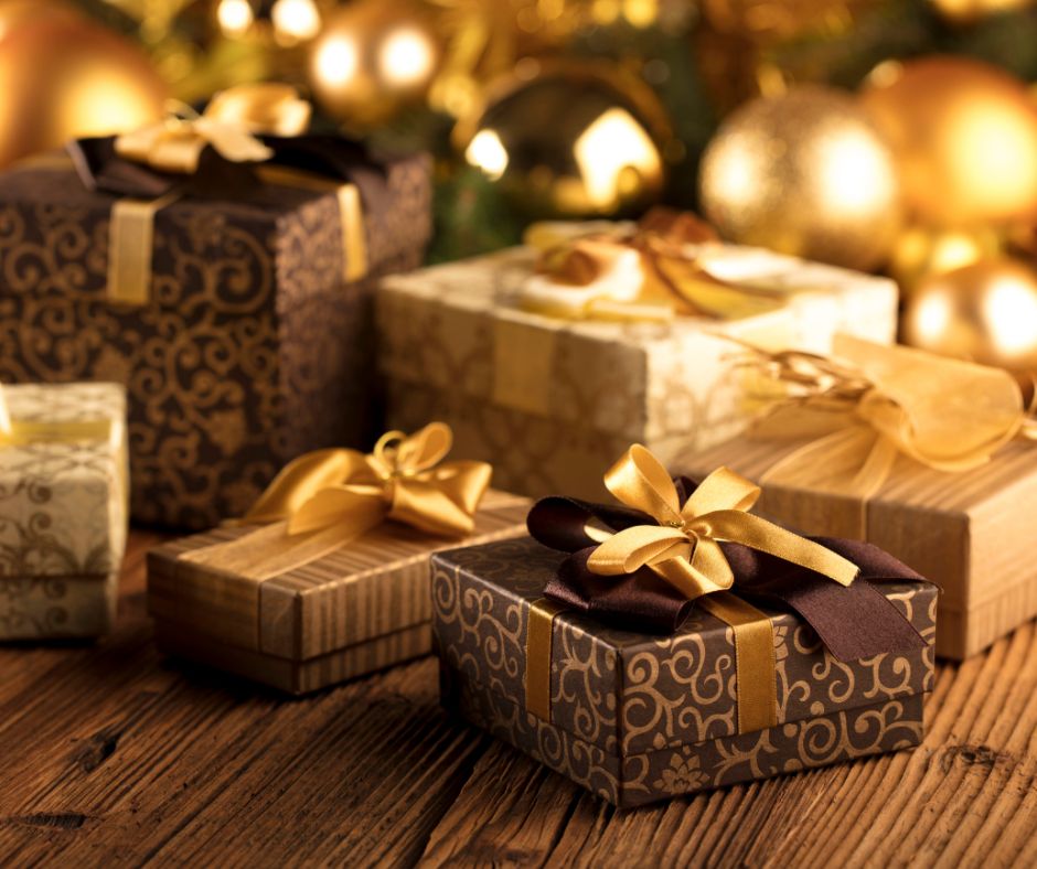 Homemade Christmas gift ideas in brown and gold boxes.