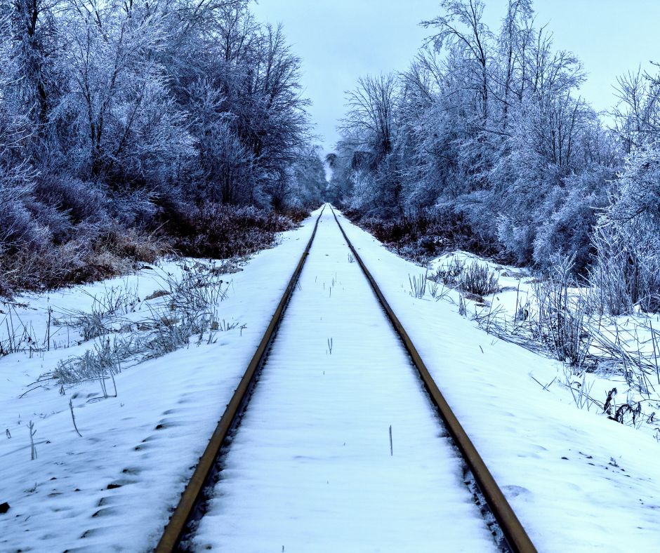 Railroad tracks in winter to show Polar Express as one of best Christmas books for kids 