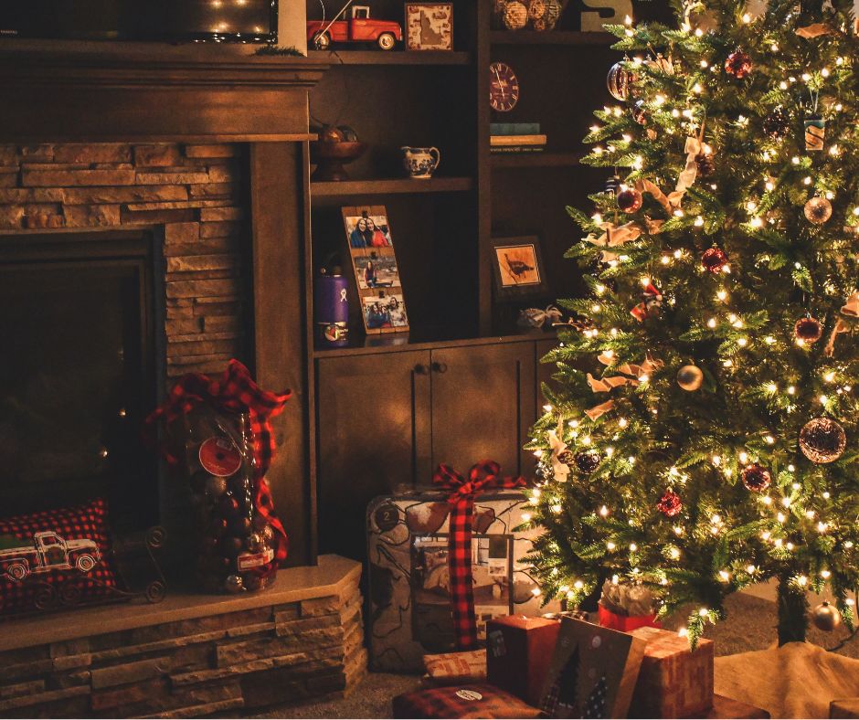 Retro photo of Christmas tree and fireplace to show decorating on the Christmas to do list