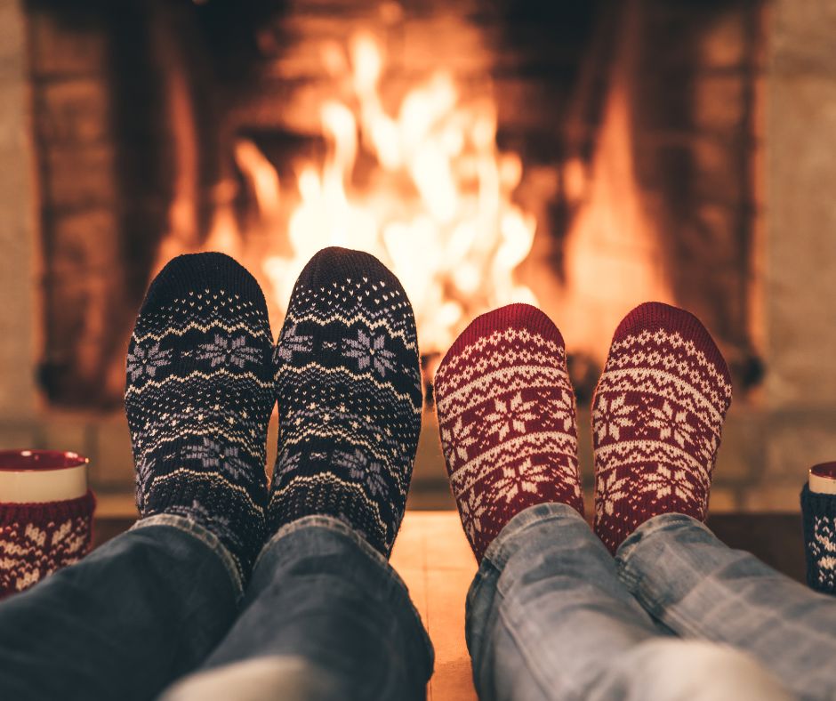 His and her socks showing Christmas gifts for couples that are for cozy nights in.